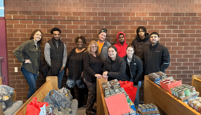 BPG Cares: 2024 Holiday Food Drive donations BPG associates with staff of Neighborhood House