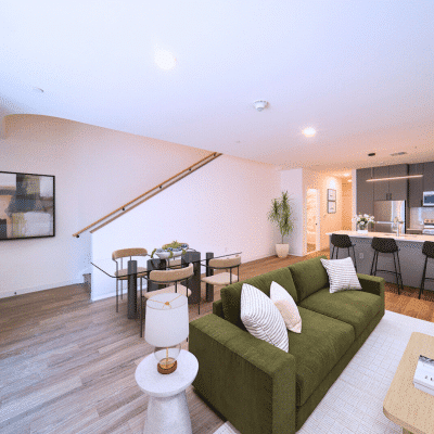 The Press in Wilmington duplex living room and kitchen with stairs two-story